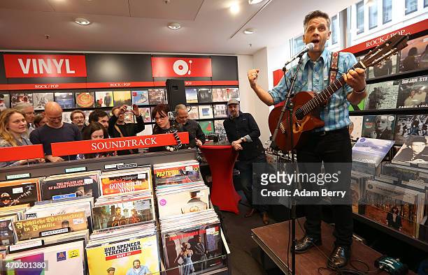 Joey Burns of Calexico performs during World Record Store Day at Dussmann on April 18, 2015 in Berlin, Germany.