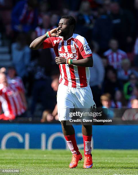 Mame Diouf of Stoke celebrates scoring his team's first goal during the Barclays Premier League match between Stoke City and Southampton at the...