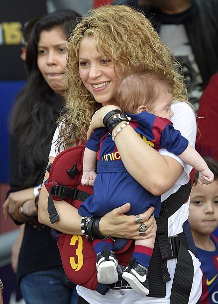 Colombian singer Shakira holds her son Sasha before the Spanish league football match FC Barcelona v Valencia CF at the Camp Nou stadium in Barcelona...