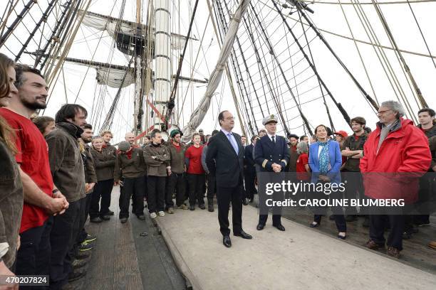 French President Francois Hollande , commander of the Hermione Yann Cariou and French Minister for Ecology, Sustainable Development and Energy...