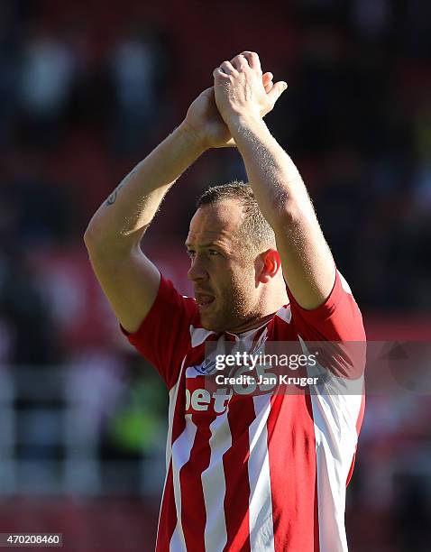 Charlie Adam of Stoke City salutes the fans at the end of the Barclays Premier League match between Stoke City and Southampton at the Britannia...