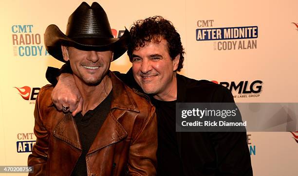 Tim McGraw and Big Machine Label Group President & CEO Scott Borchetta attend the 2014 Big Machine Label Group Show At Country Radio Seminar on...