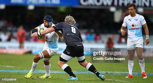 Pierre Spies tackled by Renaldo Bothma of the Cell C Sharks during the Super Rugby match between Cell C Sharks and Vodacom Bulls at Growthpoint Kings...