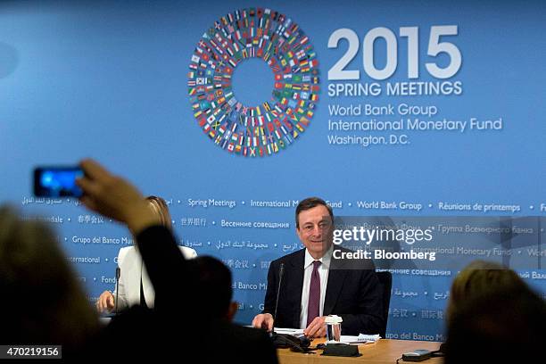 Mario Draghi, president of the European Central Bank , arrives to a news conference during the International Monetary Fund and World Bank Group...