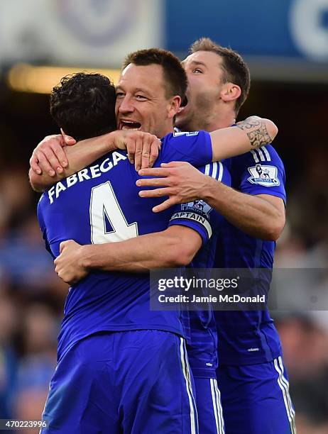Cesc Fabregas of Chelsea hugs John Terry and Branislav Ivanovic of Chelsea after the Barclays Premier League match between Chelsea and Manchester...