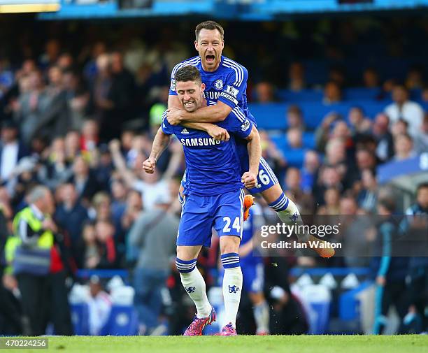 John Terry and Gary Cahill of Chelsea celebrate after the Barclays Premier League match between Chelsea and Manchester United at Stamford Bridge on...