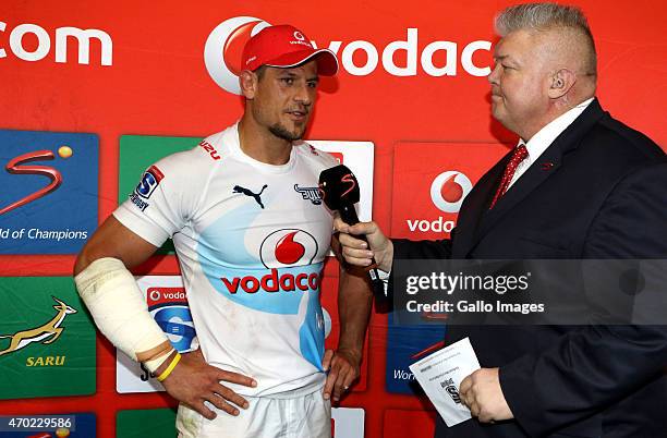 Pierre Spies of the Vodacom Blue Bulls with Kobus Wiese Supersport rugby commentator during the Super Rugby match between Cell C Sharks and Vodacom...