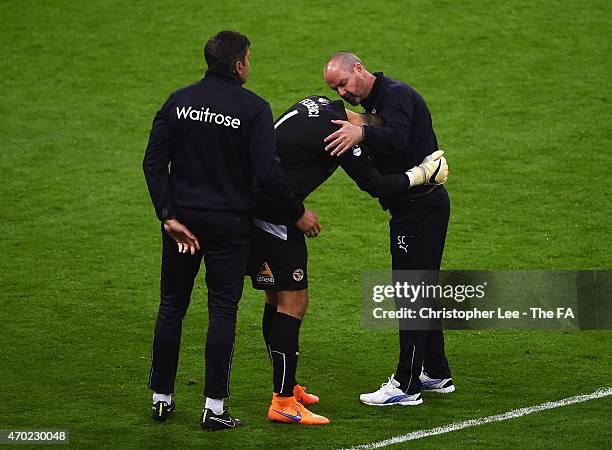 Adam Federici of Reading is consoled by Steve Clarke, manager of Reading, after the team lost the FA Cup Semi-Final match between Arsenal and Reading...