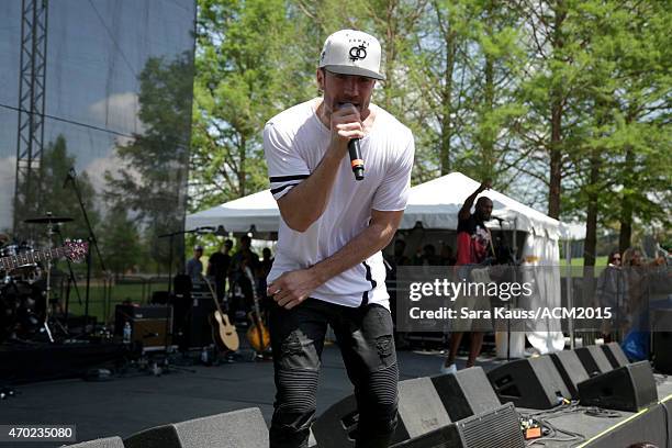 Singer/songwriter Sam Hunt performs during the ACM Party For A Cause Festival at Globe Life Park in Arlington on April 18, 2015 in Arlington, Texas.