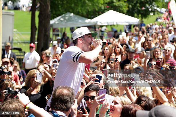 Singer/songwriter Sam Hunt performs during the ACM Party For A Cause Festival at Globe Life Park in Arlington on April 18, 2015 in Arlington, Texas.