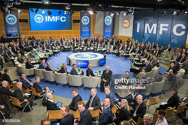 In this handout provided by the International Monetary Fund , International Monetary Fund Governors pose for a group photograph prior to the IMFC...