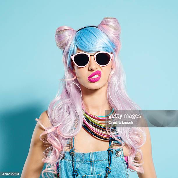 disappointed pink hair girl in funky manga outfit - dyed shades stock pictures, royalty-free photos & images