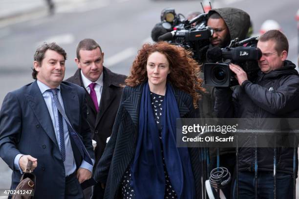 Former News International chief executive Rebekah Brooks and her husband Charlie Brooks arrive at the Old Bailey on February 19, 2014 in London,...