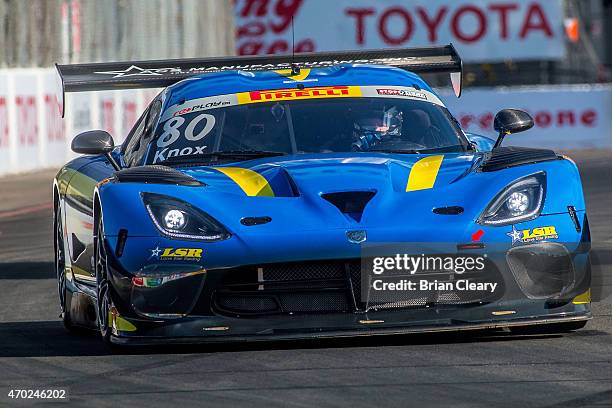 The Dodge ViperGT3R of Dan Knox races through a turn during qualifying for the Pirelli World Challenge race at Long Beach on April 18, 2015 in Long...