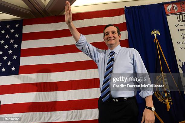 Sen. Ted Cruz waves as he speaks at the First in the Nation Republican Leadership Summit April 18, 2015 in Nashua, New Hampshire. The Summit brought...