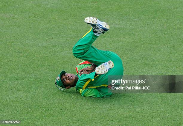 Mehidy Hazzan Miraz finishes a catch to get the wicket of James Bazley of Australia during the ICC - U19 CWC match between Australia - U19 and...