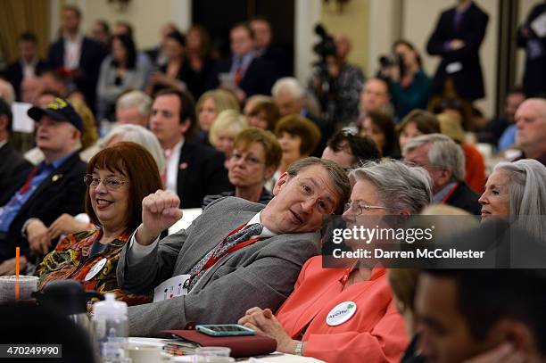 The crowd reacts during speeches at the First in the Nation Republican Leadership Summit April 18, 2015 in Nashua, New Hampshire. The Summit brought...