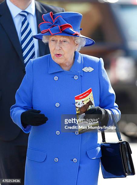 Queen Elizabeth II attends the Dubai Duty Free Spring Trials Meeting at Newbury Racecourse on April 18, 2015 in Newbury, England.