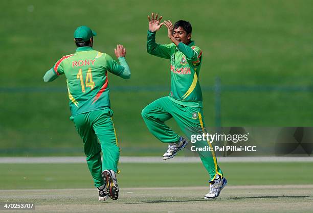 Abu Haider of Bangladesh celebrates after getting Matt Shot of Australia runout during the ICC U19 Cricket World Cup 2014 match between Australia U19...