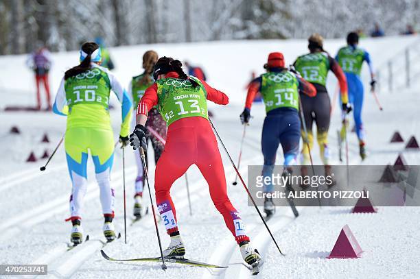 Slovenia's Katja Visnar, Poland's Justyna Kowalczyk, Russia's Julia Ivanova, Germany's Denise Herrmann and Finland's Kerttu Niskanen compete in the...