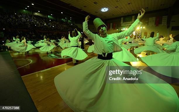 Whirling dervishes perform during the 'Holy Birth Week' celebrations marking Prophet Muhammad's birth in Bursa, Turkey on April 18, 2015. The Holy...