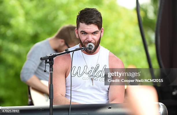 Singer-songwriter Dylan Scott performs onstage during the ACM Party For A Cause Festival at Globe Life Park in Arlington on April 18, 2015 in...