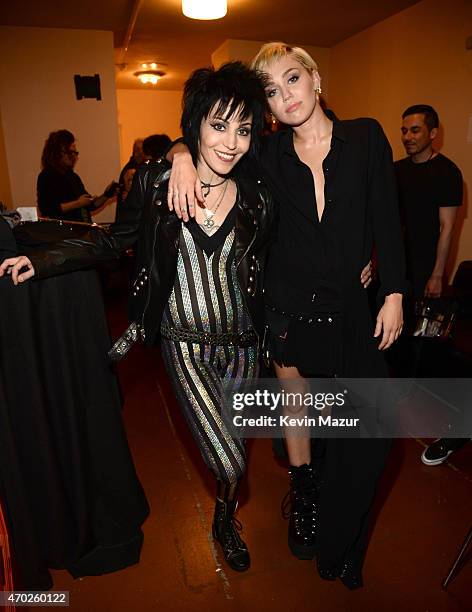 Joan Jett and Miley Cyrus attend the 30th Annual Rock And Roll Hall Of Fame Induction Ceremony at Public Hall on April 18, 2015 in Cleveland, Ohio.