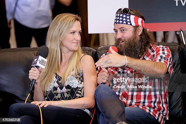 Personalities Willie Robertson and Korie Robertson speak at the Red Carpet Radio presented by Westwood One Radio during the 50th Academy of Country...
