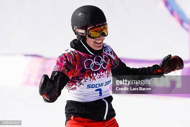 Patrizia Kummer of Switzerland celebrates winning the gold medal in the Snowboard Ladies' Parallel Giant Slalom Finals on day twelve of the 2014...