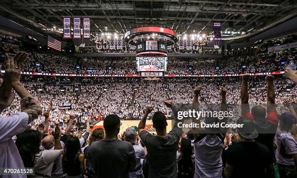 Toronto Raptors fans cheer for their team during a break in the action in the first half of Toronto Raptors fans cheer for their team during a break in the action in the first half of
