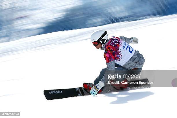 Rok Flander of Slovenia competes in the Snowboard Men's Parallel Giant Slalom Quarterfinals on day twelve of the 2014 Winter Olympics at Rosa Khutor...