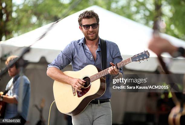 Singer Brett Eldredge performs onstage during the ACM Party For A Cause Festival at Globe Life Park in Arlington on April 18, 2015 in Arlington,...