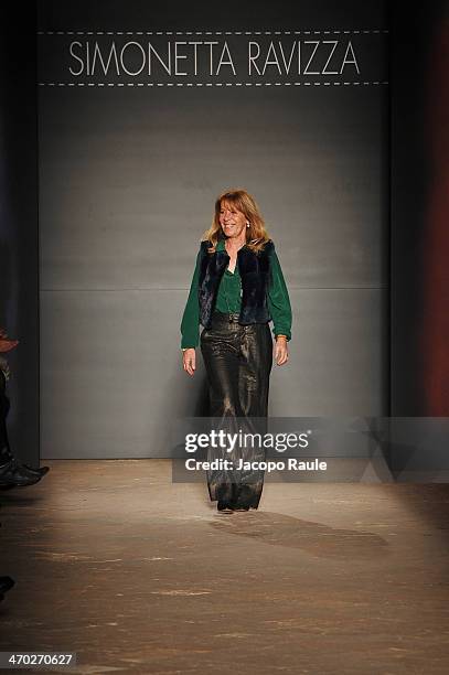 Designer Simonetta Ravizza acknowledges the applause of the audience after the Simonetta Ravizza show during Milan Fashion Week Womenswear...