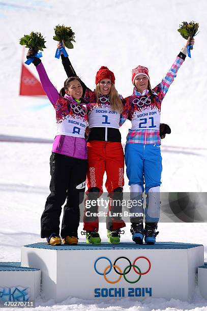 Silver medalist Tomoka Takeuchi of Japan, gold medalist Patrizia Kummer of Switzerland and bronze medalist Alena Zavarzina of Russia celebrate on the...