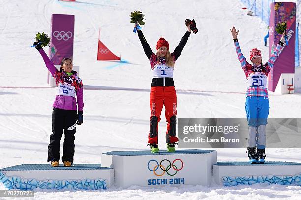 Silver medalist Tomoka Takeuchi of Japan, gold medalist Patrizia Kummer of Switzerland and bronze medalist Alena Zavarzina of Russia celebrate on the...