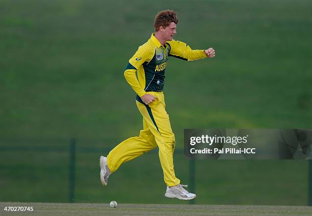 Thomas Andrews of Australia celebrates the wicket of Shadman Islam of Bangladesh during the ICC - U19 CWC match between Australia - U19 and...