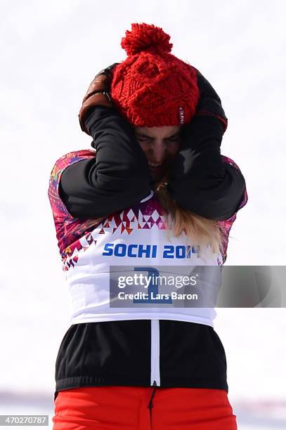 Gold medalist Patrizia Kummer of Switzerland celebrates during the flower ceremony for the Snowboard Ladies' Parallel Giant Slalom Finals on day...