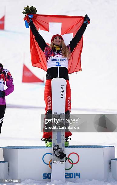 Gold medalist Patrizia Kummer of Switzerland celebrates during the flower ceremony for the Snowboard Ladies' Parallel Giant Slalom Finals on day...