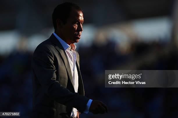 Jose Guadalupe Cruz, Head Coach of Puebla looks on during a match between Puebla and Atlas as part of 14th round Clausura 2015 Liga MX at Olimpico...