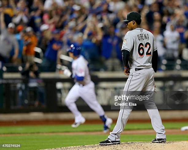 Jose Urena of the Miami Marlins reacts as Wilmer Flores of the New York Mets rounds third after he hit a two run homer in the sixth inning on April...