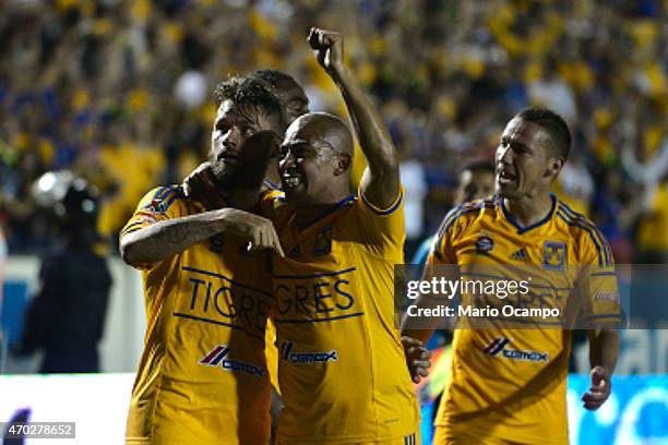 Rafael Sobis of Tigres celebrates with teammates after scoring his team's second goal during a match between Tigres UANL and Monterrey as part of...