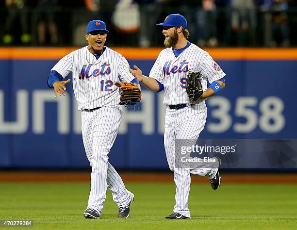 Juan Lagares and Kirk Nieuwenhuis of the New York Mets celebrate the 5-4 win over the Miami Marlins on April 18, 2015 at Citi Field in the Flushing...