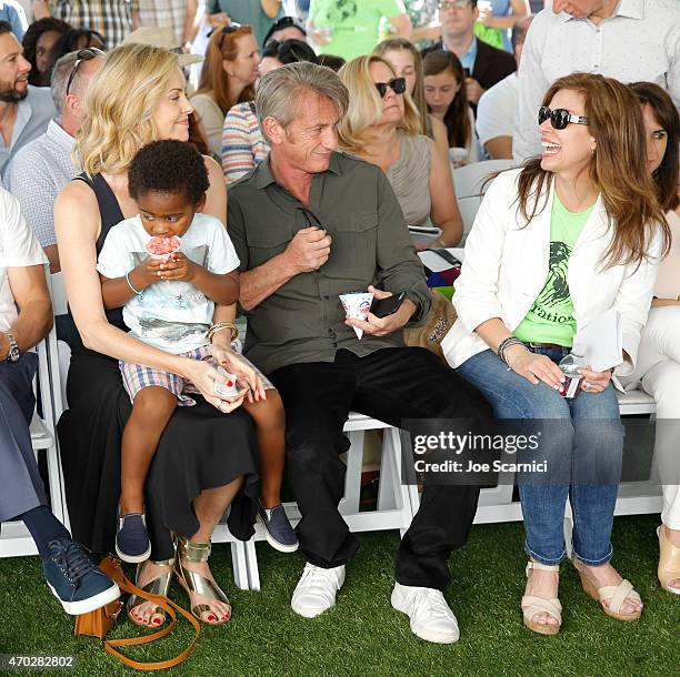 Jackson Theron, actress Charlize Theron, actor Sean Penn and CEO of Points of Light Tracy Hoover attend the Points of Light generationOn Block Party...