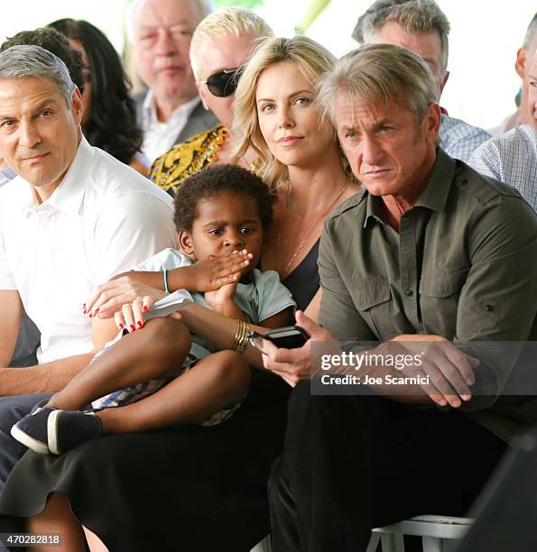 Actress Charlize Theron, Jackson Theron and actor Sean Penn attend the Points of Light generationOn Block Party on April 18, 2015 in Los Angeles,...