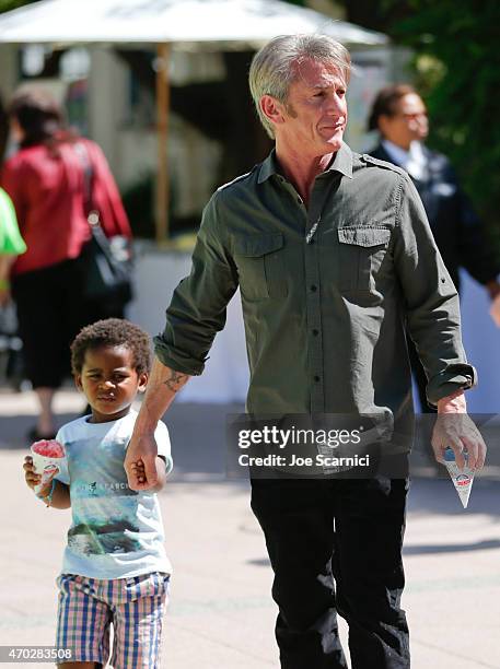 Jackson Theron and actor Sean Penn attend the Points of Light generationOn Block Party on April 18, 2015 in Los Angeles, California.