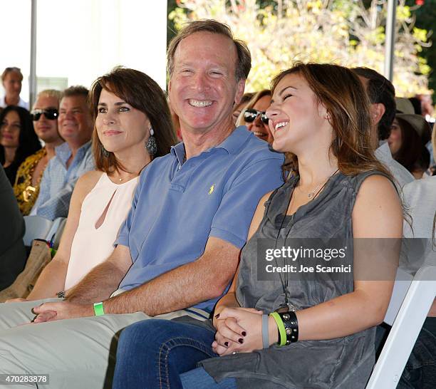 Maria Bush and Chairman of the Board of Points of Light Neil Bush and singer Alexis Wilkins attend the Points of Light generationOn Block Party on...