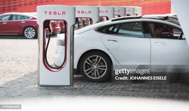 To go with AFP story China-auto-show-environment-Tesla,FOCUS by Bill Savadove This picture taken on March 17, 2015 shows a Tesla Model S being...