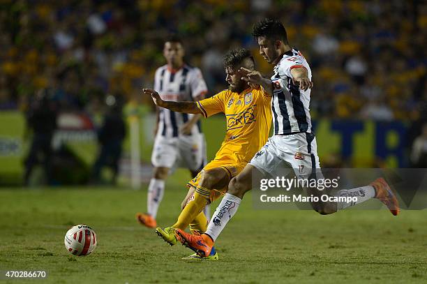 Rafael Sobis of Tigres fights for the ball with Jesus Zavala of Monterrey during a match between Tigres UANL and Monterrey as part of 14th round...