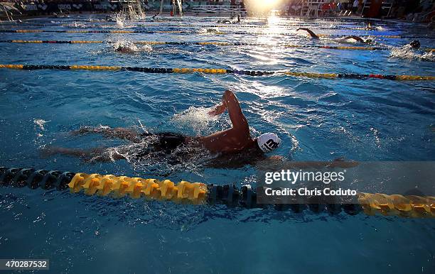 Ryan Lochte warms up in the practice pool during day four of the Arena Pro Swim Series at the Skyline Aquatic Center on April 18, 2015 in Mesa,...