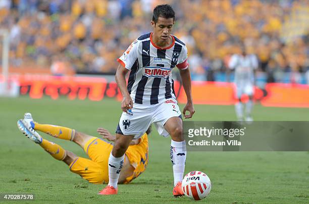 Severo Meza of Monterrey drives the ball during a match between Tigres UANL and Monterrey as part of 14th round Clausura 2015 Liga MX at...